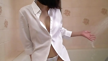 Japanese brunette Kaede Kyomoto shows her sexy body to a boy uncensored.