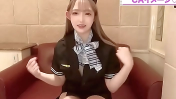 ASMR performing erotic services in cabin attendant cosplay