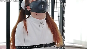 asian latex catsuit woman straitjacket bondage