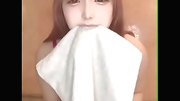 Changing into a uniform. Be careful not to lick your pants.