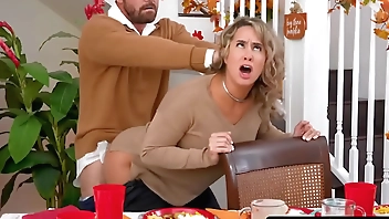 This Thanksgiving horny redhead stepsisters Arietta Adams and Cherry Fae fuck their stepbrother in the living room, while their stepdad fucks their stepmom in the dining room.