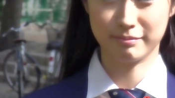 Tomomi Motozawa in school uniform sucks a classmate