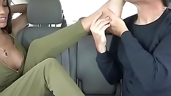 Foot worship in car