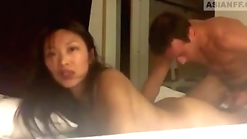 Exchange student from Asia getting extra lesson in teachers bed