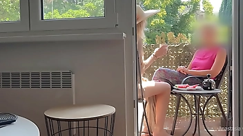 My husband is jerking off and cum in front of my stepmom a while we talk on balcony.