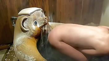 With the mouth of a raccoon.