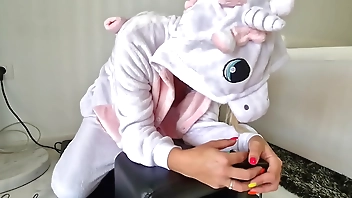 Unicorn Milf rides on a Sybian sexmachine and she almost gets a blackout