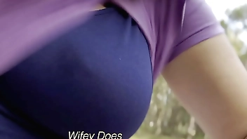 MILF flashes tits in public hike