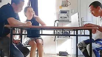 While the cuckold does the math, his cheating wife drains the contractor's cum under the table.